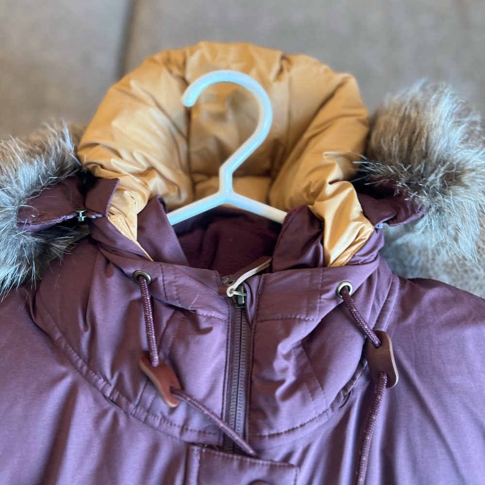 Purple Prana vest with faux fur hood.